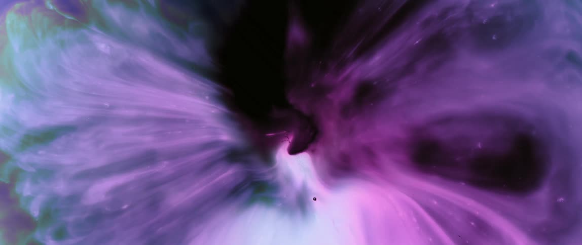 Abstract expanding vortex with predominantly pink coloring