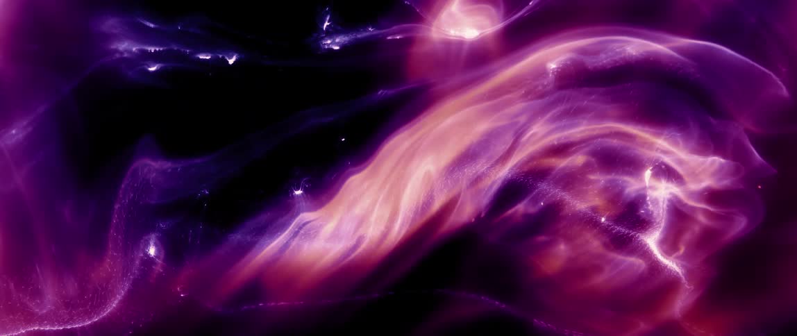 Bright colorful layers contrast with the black background while they flow and expand