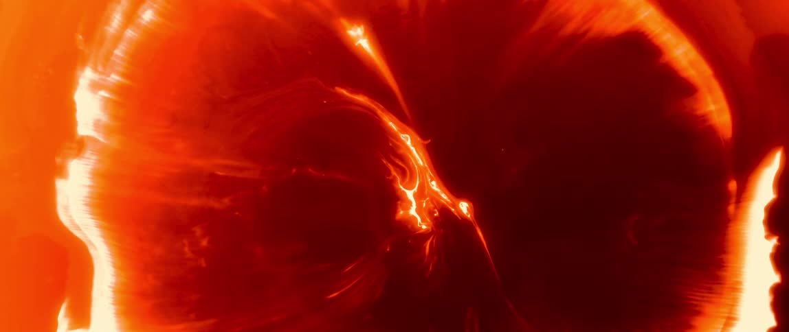Abstract pattern in orange and red tones with energy flows