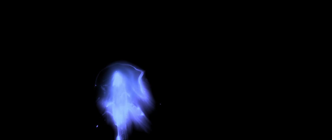 Abstract texture blue fading into a black background