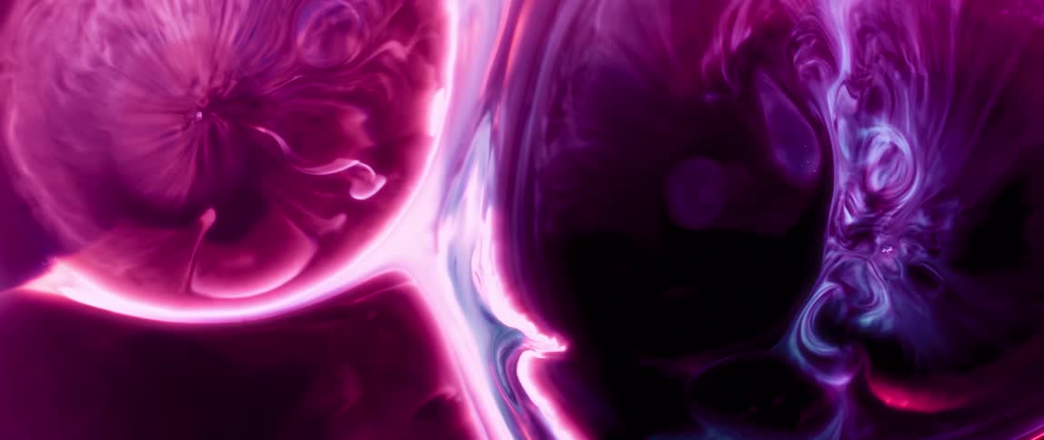 A vibrant abstract scene with swirling colorful patterns in shades of purple blue and orange
