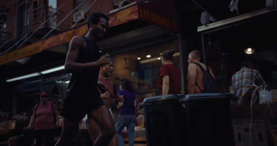 A footage of a male and female running