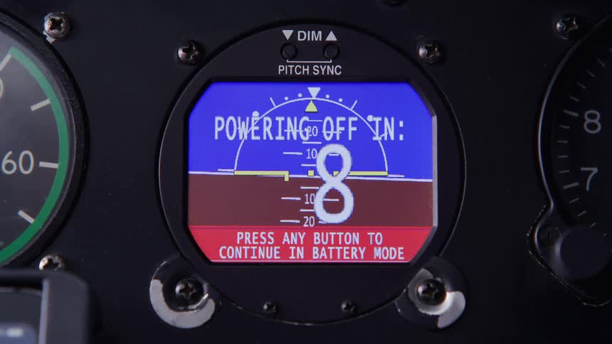 Close up of a helicopter control panel displaying information