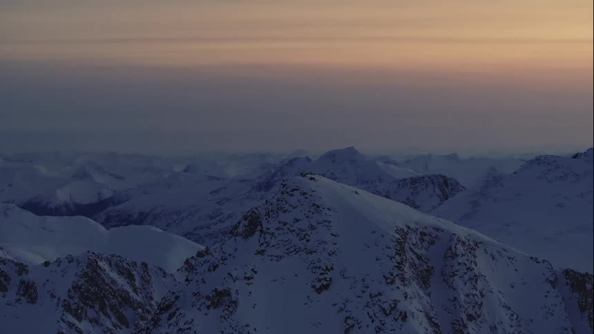 Aerial landscape of snowy mountain peaks