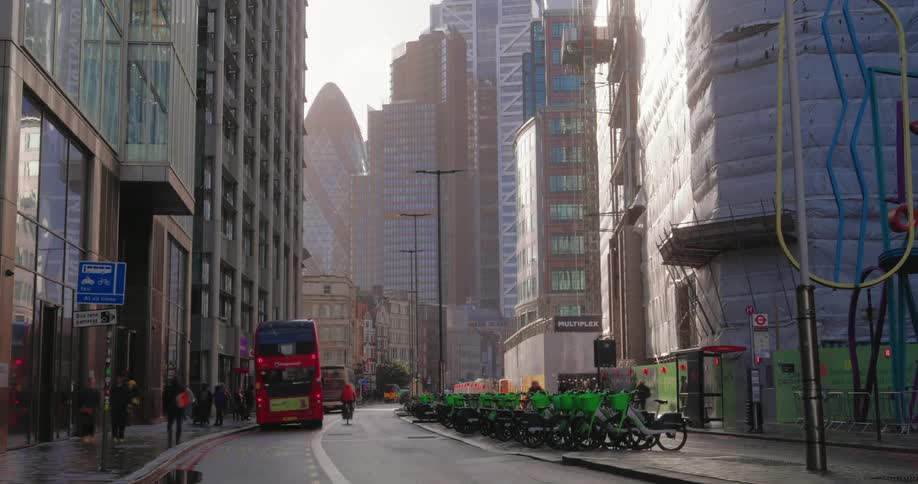 Time lapse photography on a downtown city with vehicles and pedestrians