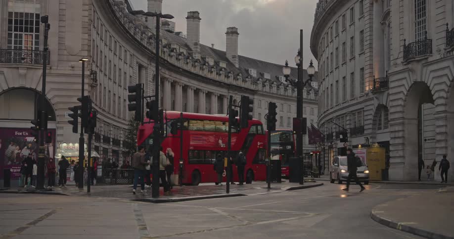 Pedestrians and vehicle traffic on the streets of a classic metropolis