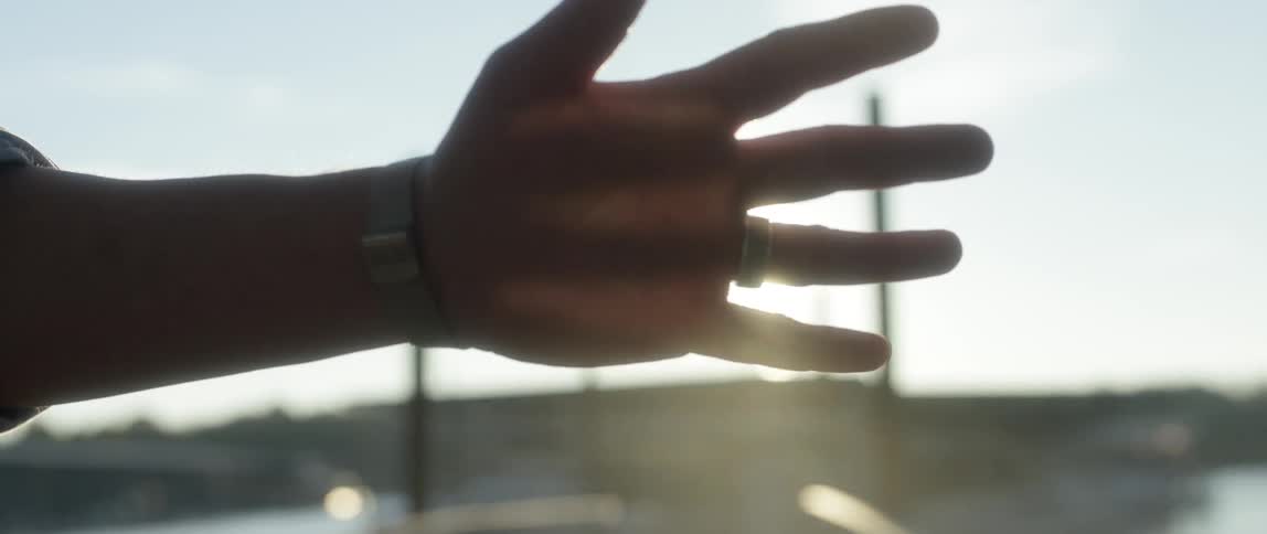 Person holding their hand outstretched