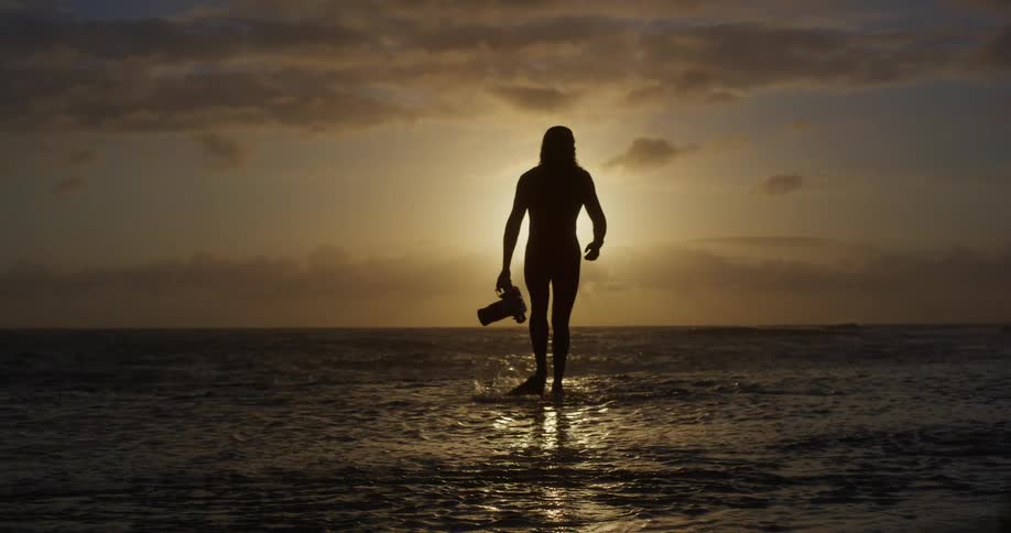 A footage of a diver coming out from the sea