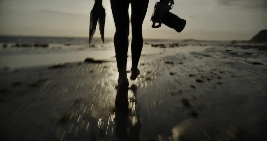 A footage of a person running at the sea shore