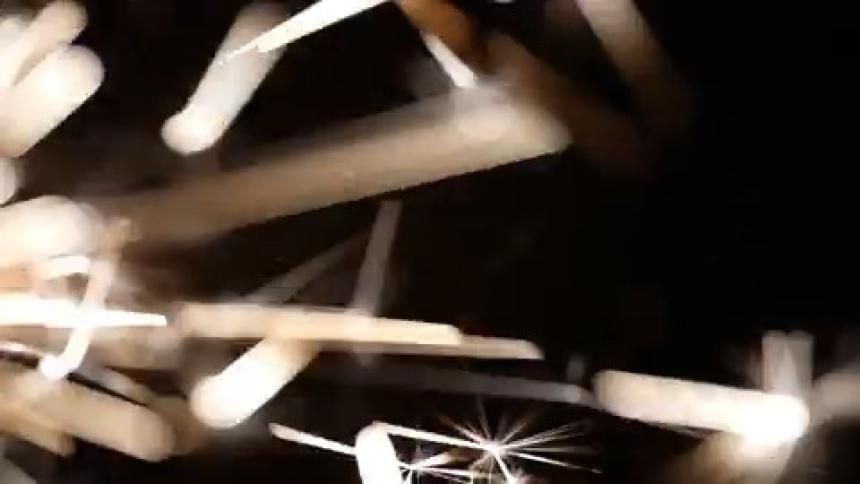 Close up of abstract sparks against a dark background