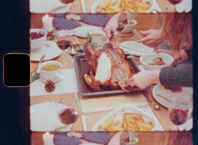 Pair of hands serving chicken on the table