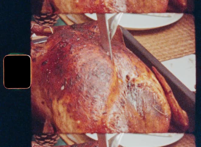 A turkey is being carved on the table