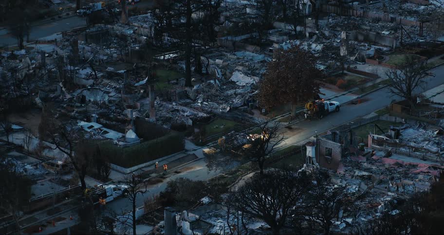 Aerial view of destroyed houses in an urban neighborhood
