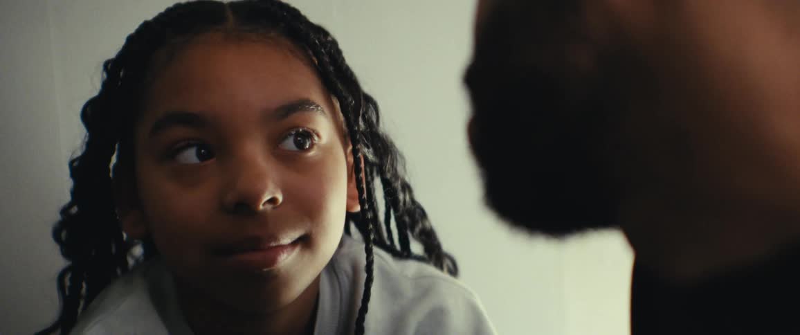 A daughter is talking with her father