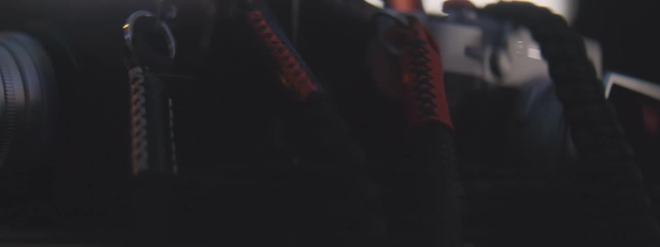 Cameras are on display with their straps