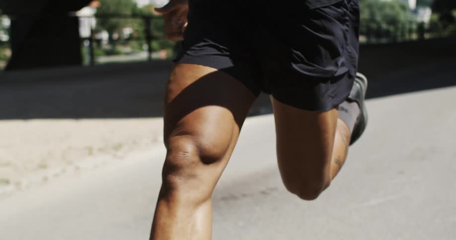 A man is running down the trail