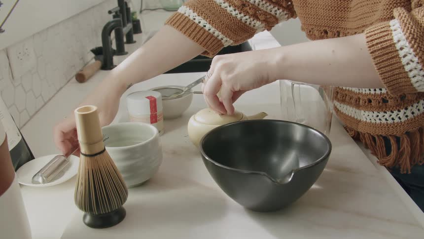 Pair of hands covering a bowl
