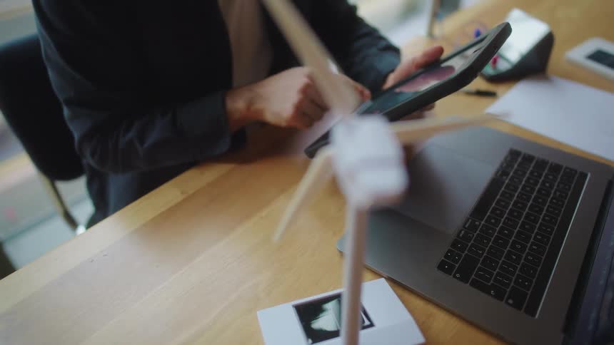 Man sitting typing on a laptop