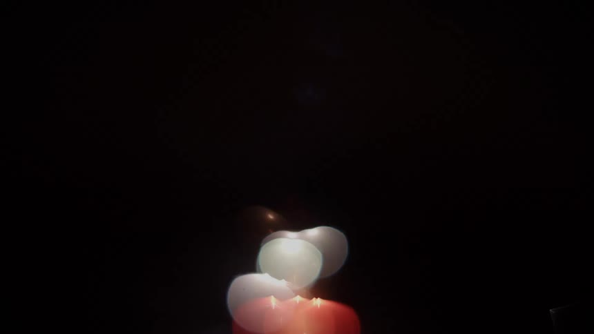 Abstract reflection of a fireworks light show against a night sky