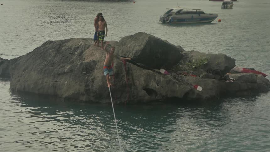 A person tightrope walking
