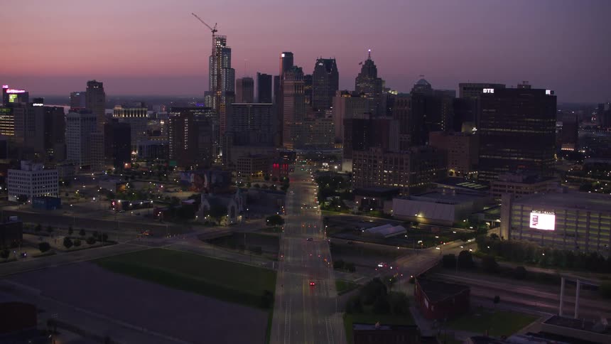 The sun is setting on the large city