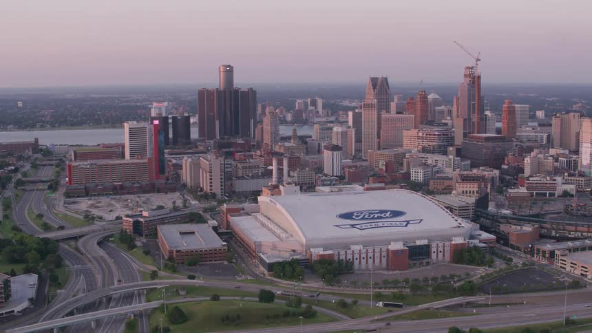 A large stadium is in the big city