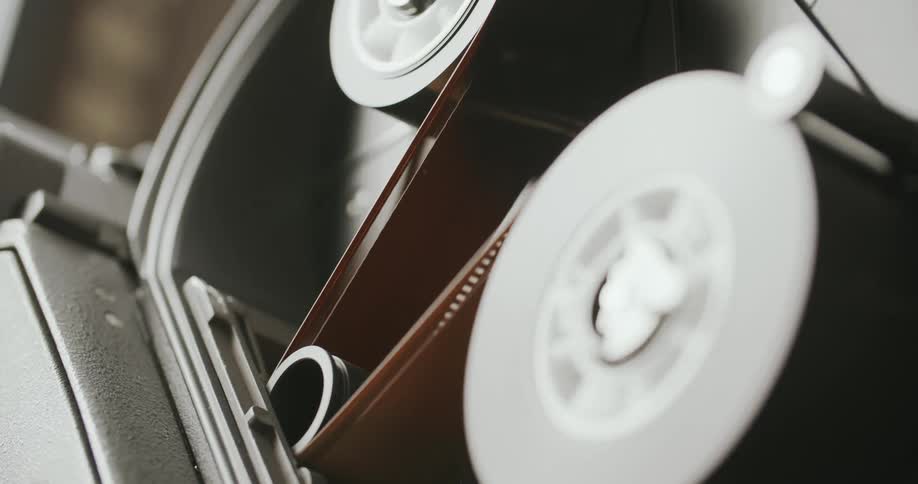 Camera film spinning on reels