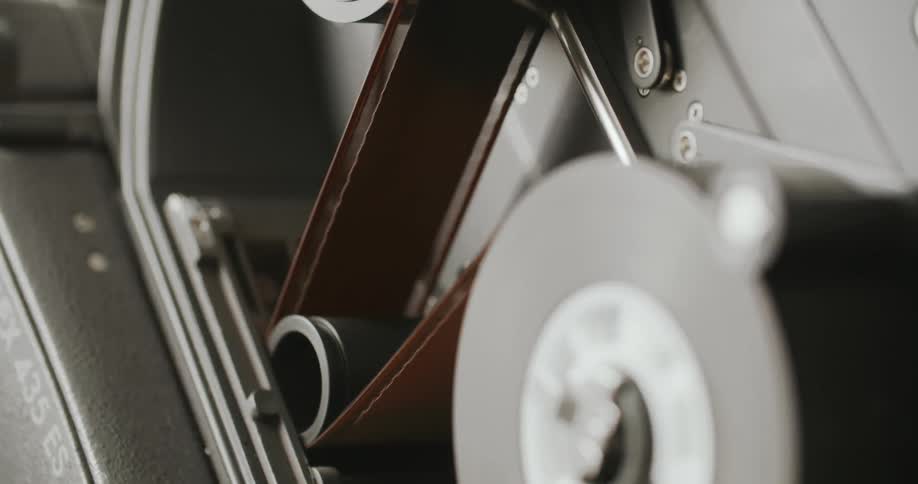 Leather straps roll through a machine