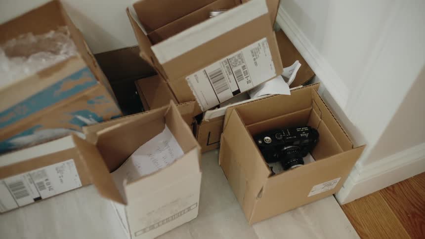 Open boxes in a corner of the house