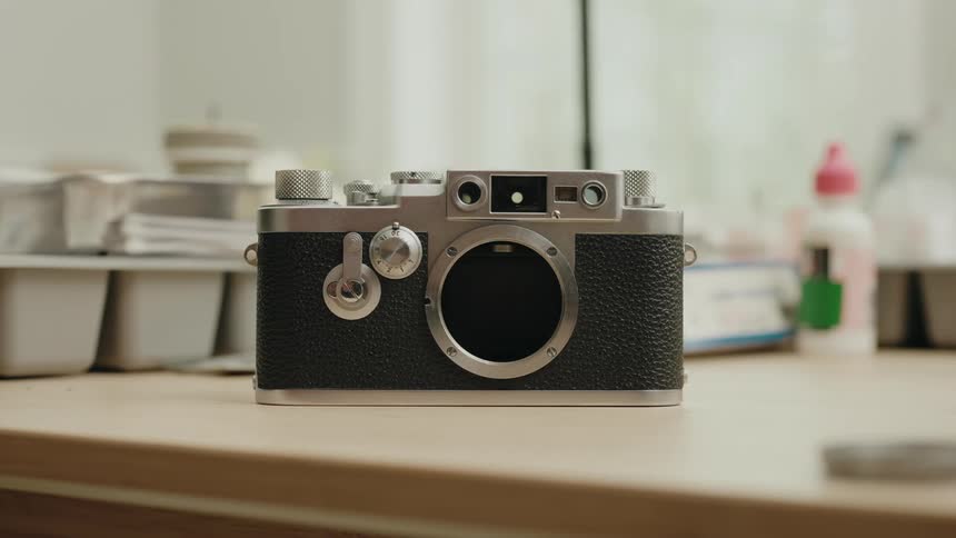 Camera sits on a table near the window