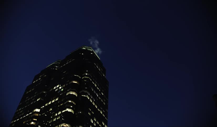 Illuminated building against a night sky