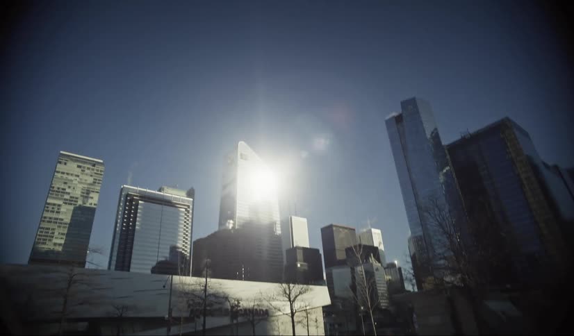 Tall towers stretch into the sky on a sunny day