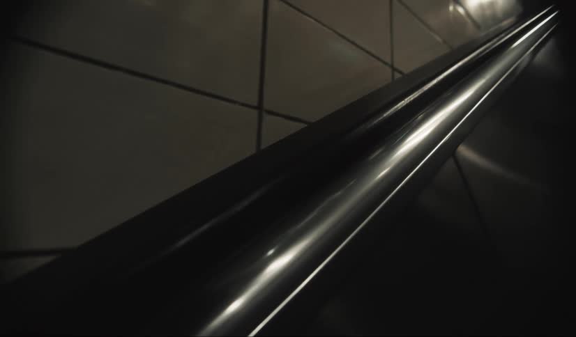 Moving view of an escalator going up