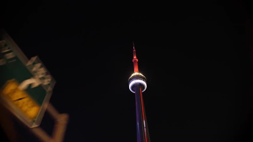 View up the cn tower illuminated at night