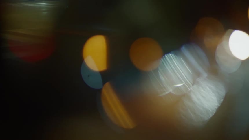Abstract reflection of city lights at night