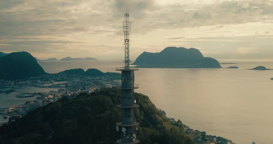A large antenna is on the island near the town