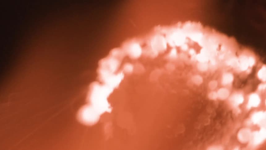 A fiery explosion with glowing embers and smoke