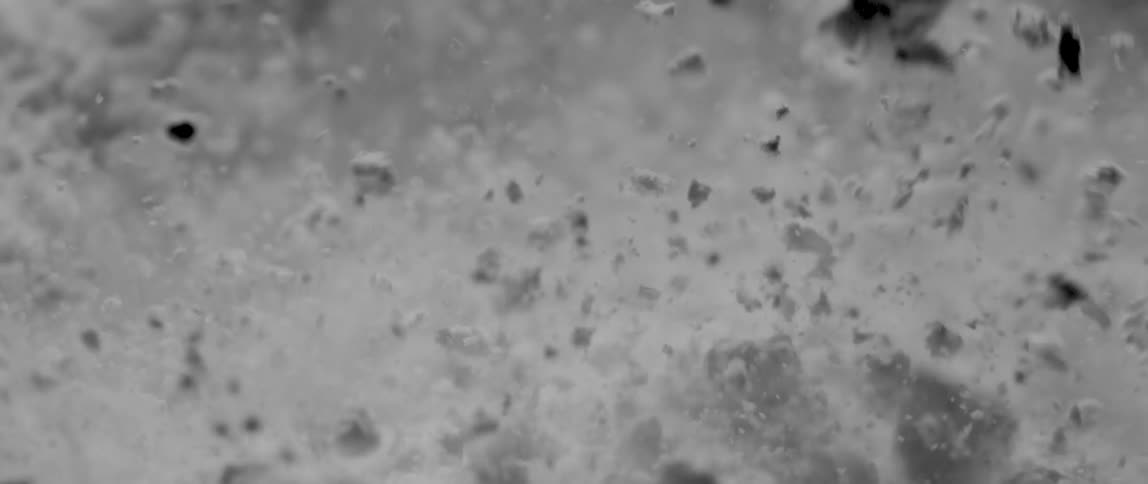 The chaotic motion of splashing particles