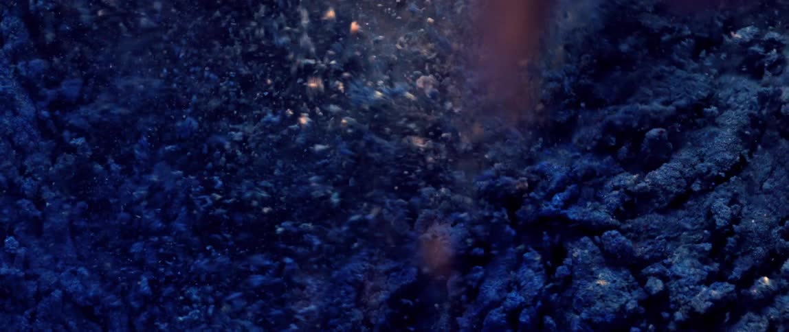 Close up of abstract dust particles in flickering motion