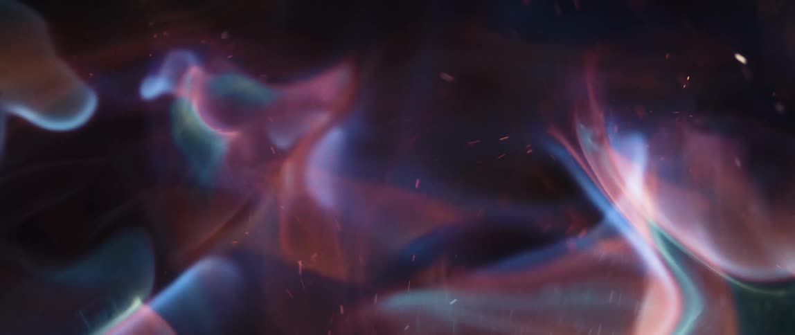 Abstract swirling forms with a mix of blue white and subtle orange hues