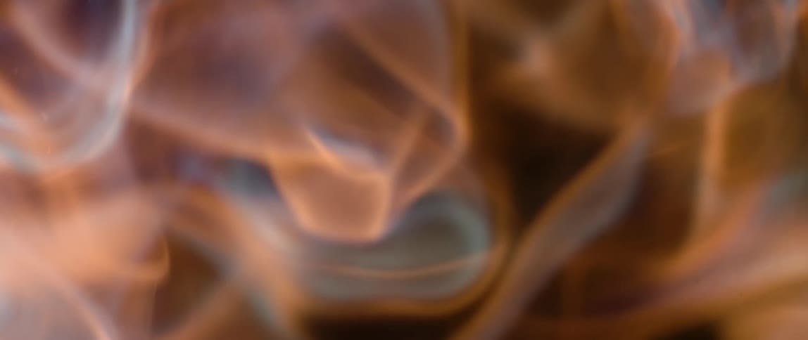 A dynamic image of swirling fire creating an intense and visually captivating effect