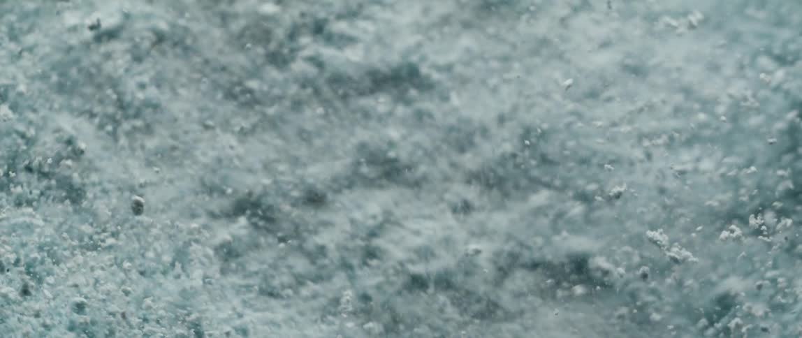 Shivering white powder particles