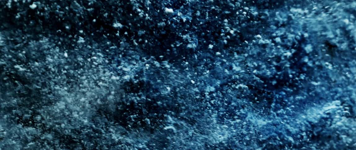 Close up of an abstract blue liquid