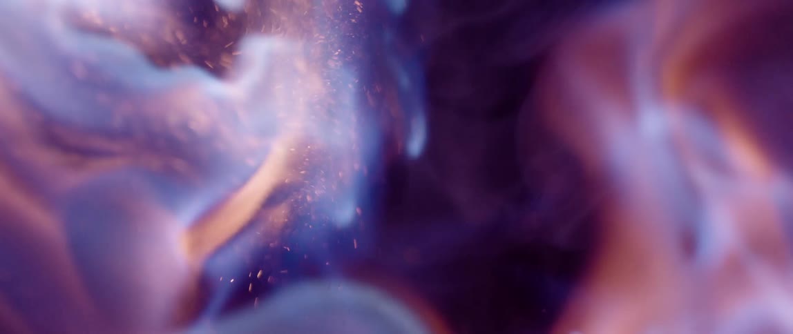 Extreme close up on fire against a black background