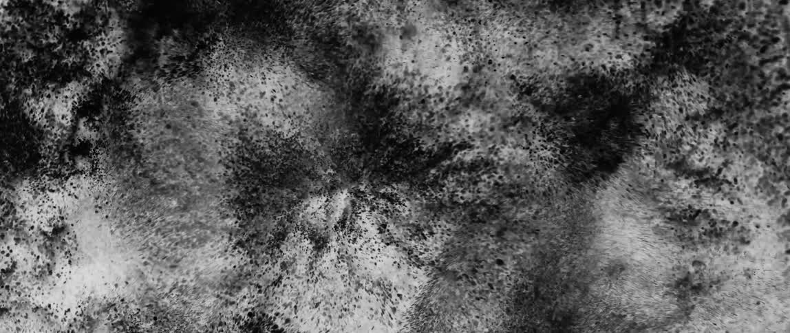 Extreme closeup on an abstract powder in motion