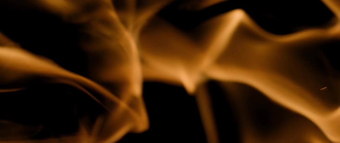 A fire is burning at night