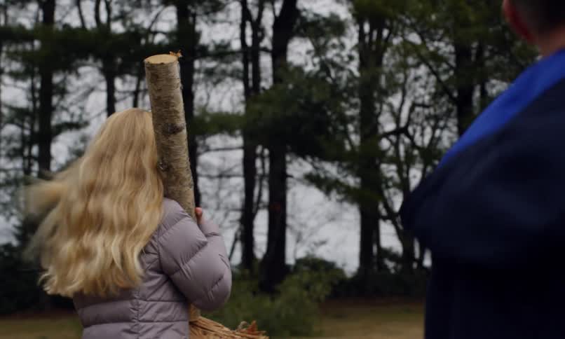 A clip of kids lifting lumber