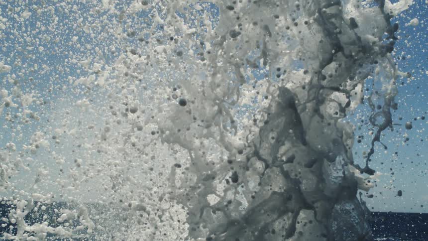 Foam with water rising in the ocean