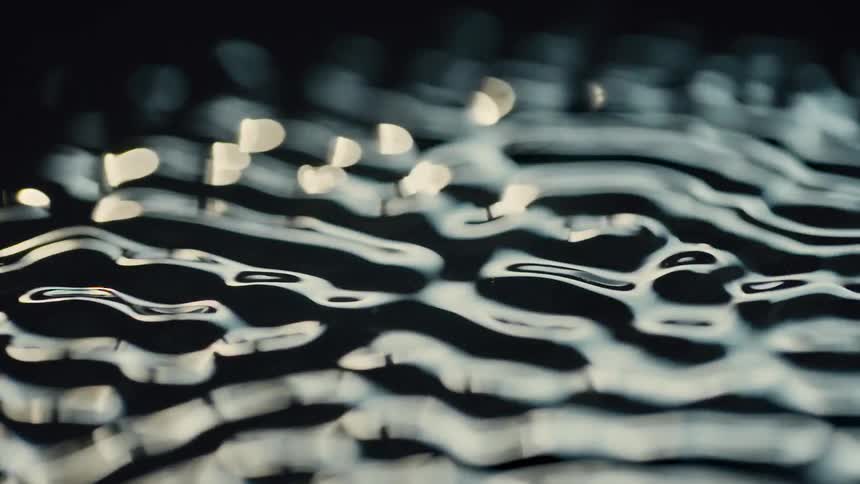 Water Cymatics, Extreme close up on a moving liquid surface