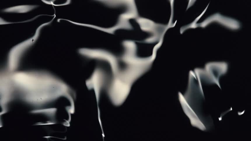 Water Cymatics, Dark liquid dances with abstract reflections of light